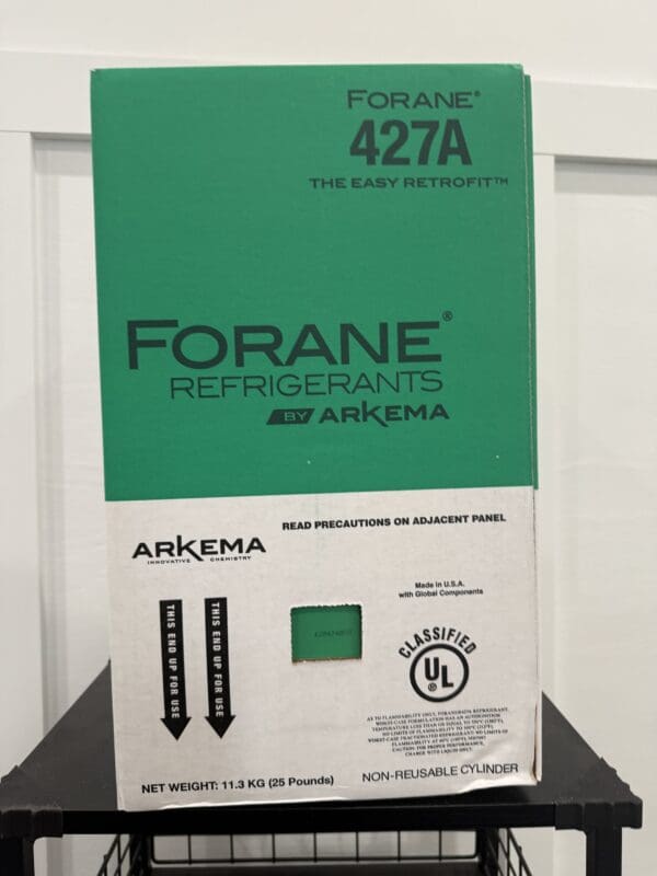 A green and white Forane 427A refrigerant container with safety labels.